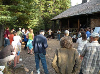 Community members gather outside Skyliner Lodge